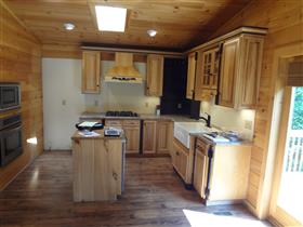 Before kitchen (stained cabinets): 