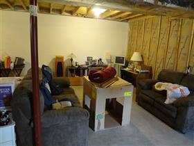 *Before* - Customer had an unfinished basement which he wanted to finish off so they could enjoy the area.: 